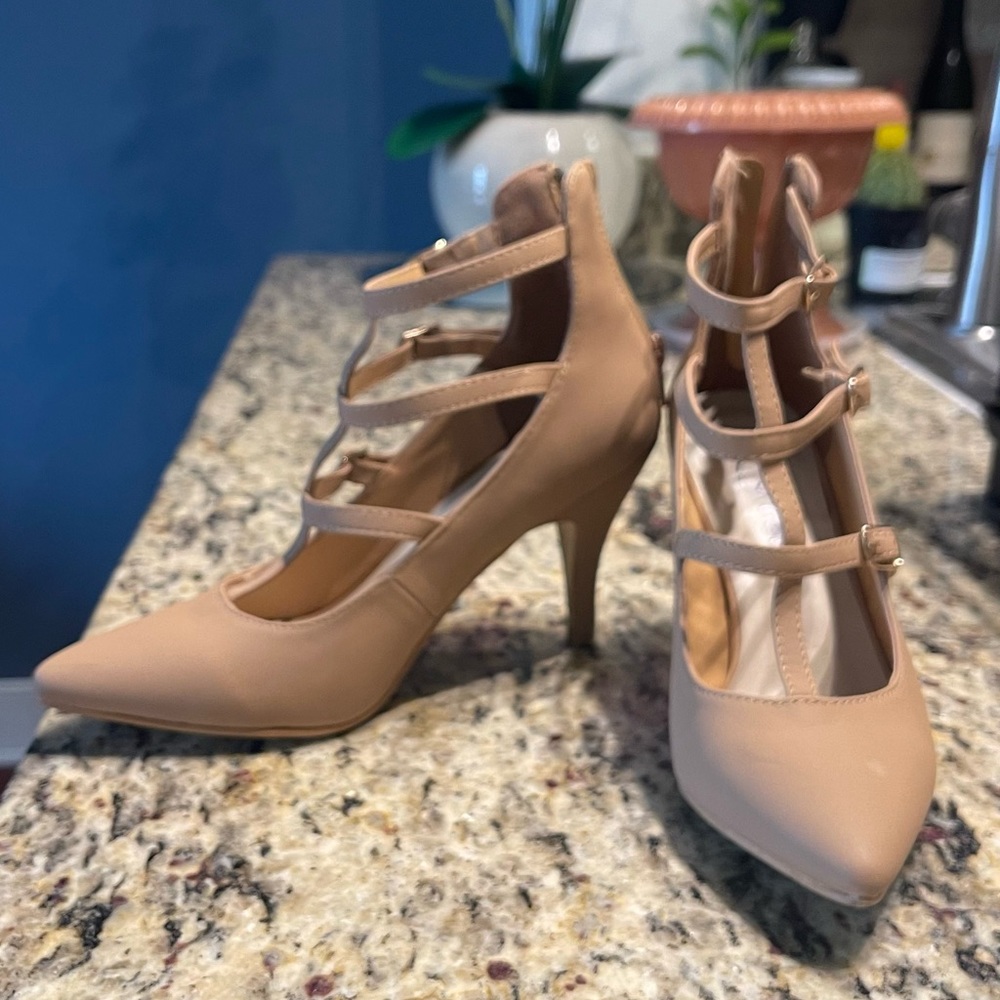 Femi buckle embellished cage strap pointy toe pump zipper behind the heel